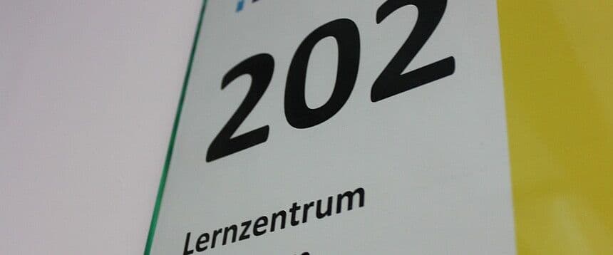 a close up of a sign with the number 202 on it .